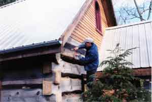 Ken doing wire lath to prepare for chinking